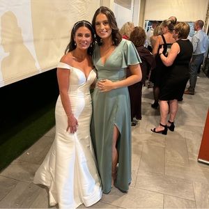 Azazie brand matcha colored bridesmaids dress.